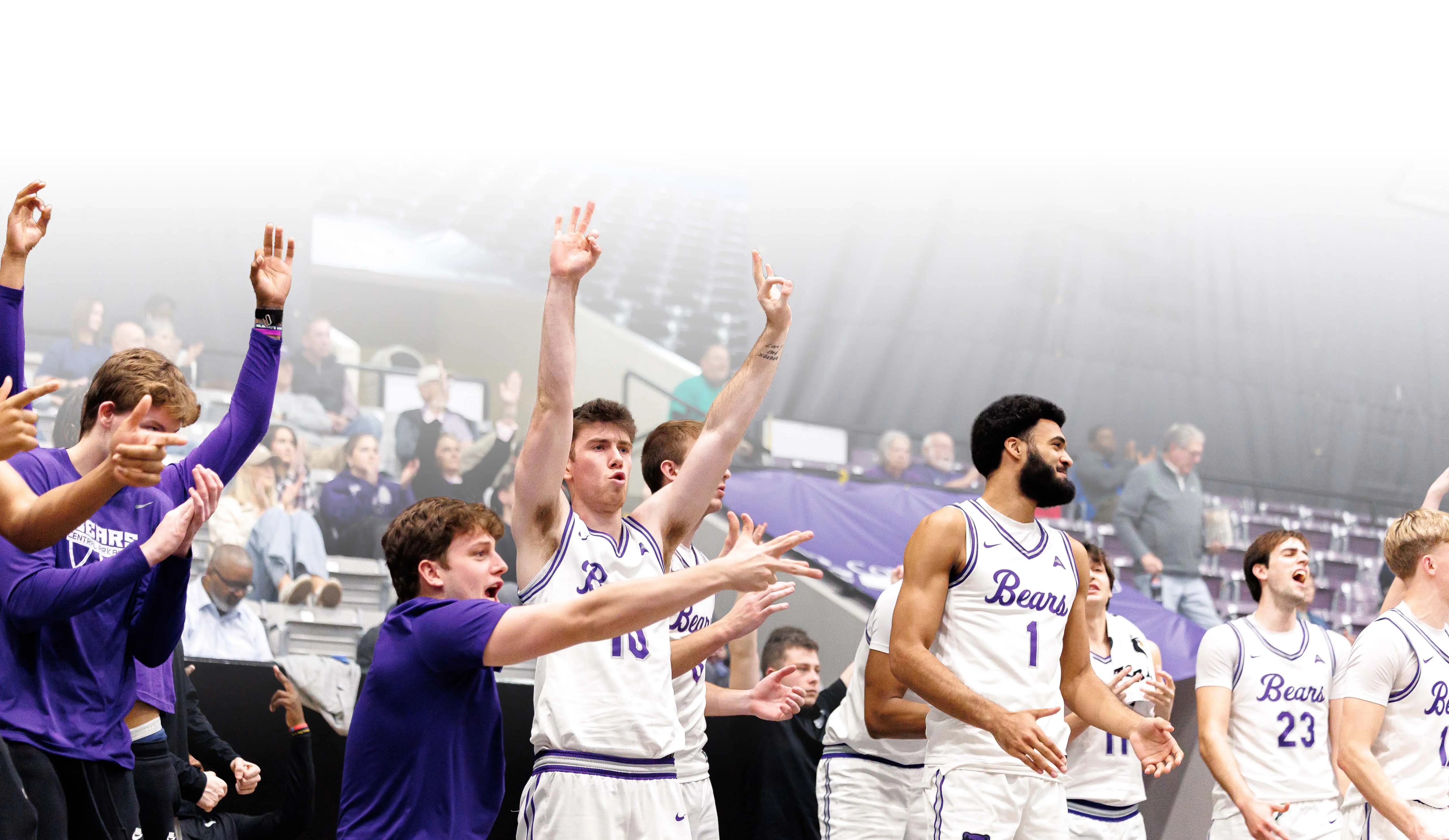 Football players running onto field