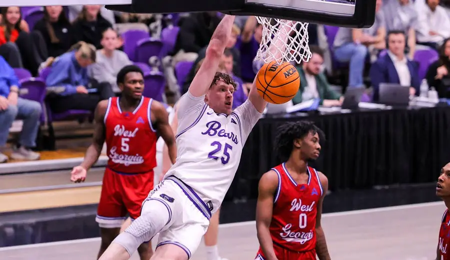 mens basketball player taking a shot