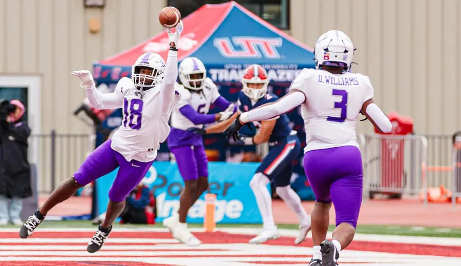 Women's golfer admiring her shot