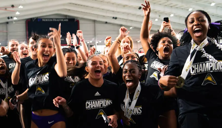 Track runner in starting stance