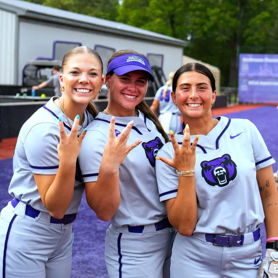 female volleyball players celebrating